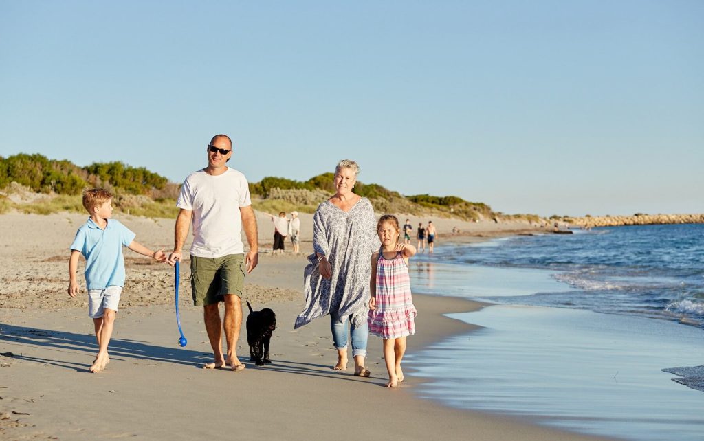 Family walking on the beach in Fremantle
