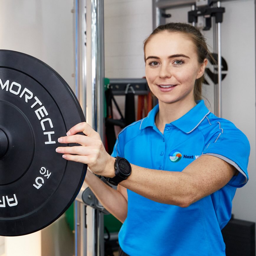 Female Racking Weights Therapeutic Exercise & Rehab Programs Perth | Next Wave Therapy