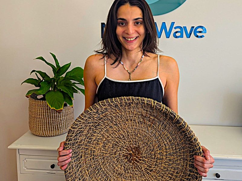 Occupational Therapist holding woven basket for neurodivergent women flow state art group